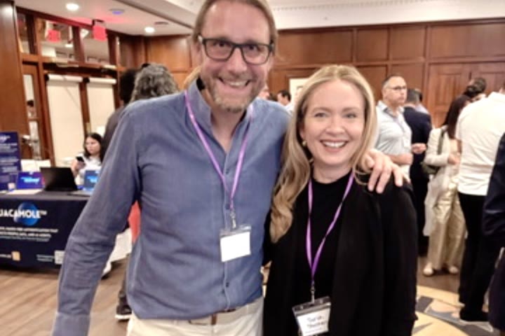 Tarja and a fellow author at an evening event.