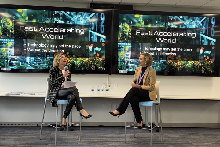 Tarja on stage in a fireside conversation titled Fast accelerating world.